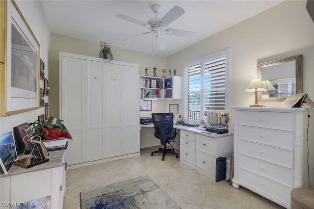 tiled office space with ceiling fan