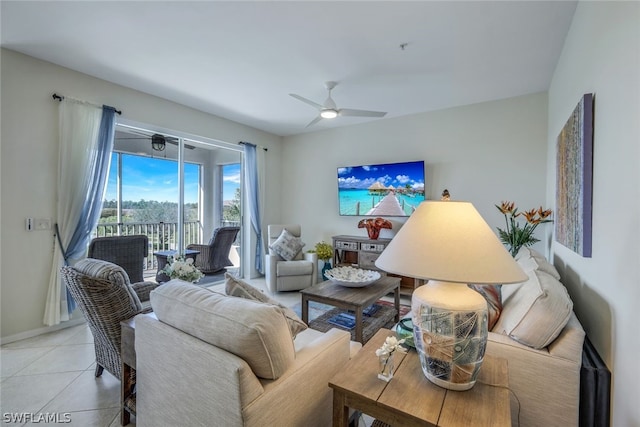 tiled living room featuring ceiling fan