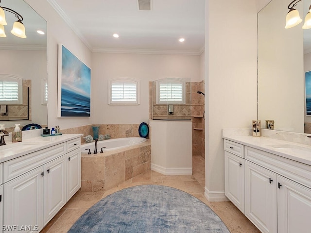 bathroom featuring tile floors, ornamental molding, separate shower and tub, and vanity