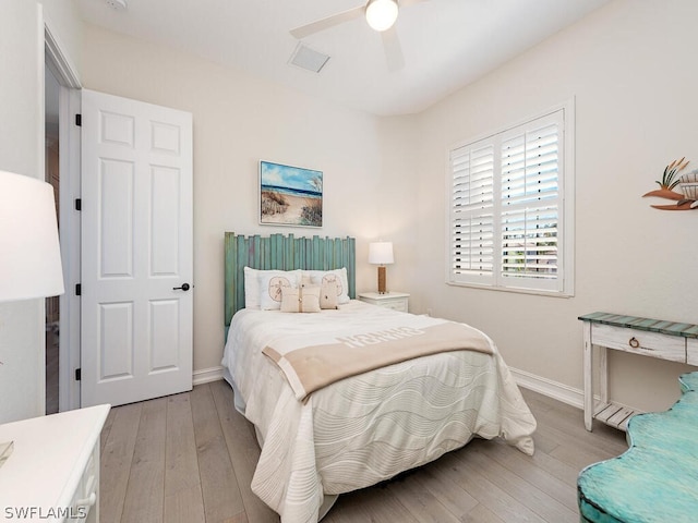 bedroom featuring ceiling fan and light wood-type flooring