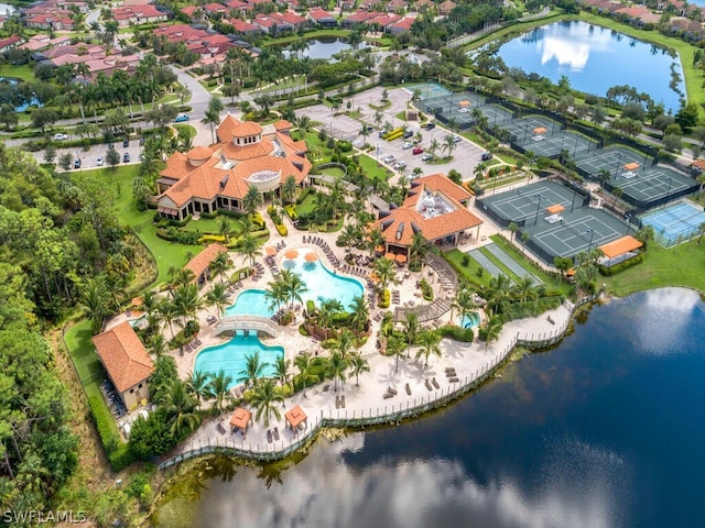 birds eye view of property featuring a water view