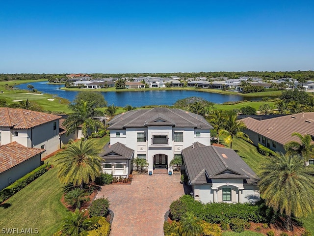 drone / aerial view with a water view