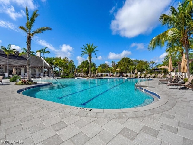 pool with a patio area