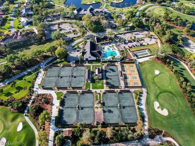 birds eye view of property with view of golf course