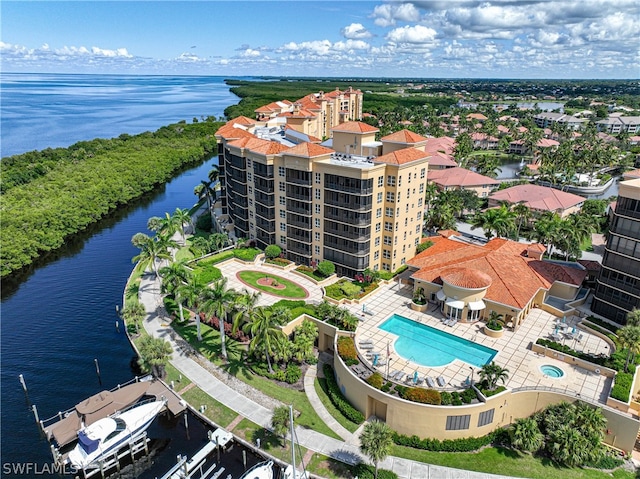 drone / aerial view with a water view