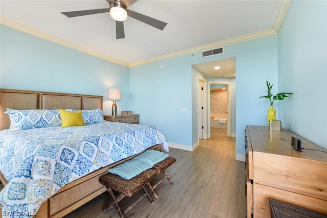 bedroom featuring connected bathroom, ornamental molding, ceiling fan, and hardwood / wood-style flooring