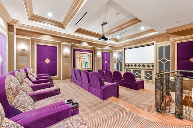 carpeted home theater room with coffered ceiling and ornamental molding