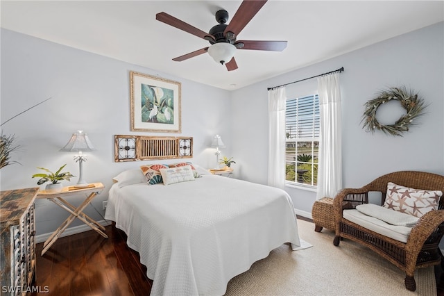 bedroom featuring ceiling fan and hardwood / wood-style floors