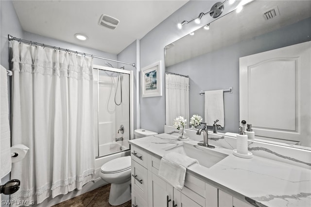 full bathroom with toilet, vanity, tile patterned floors, and shower / bathtub combination with curtain