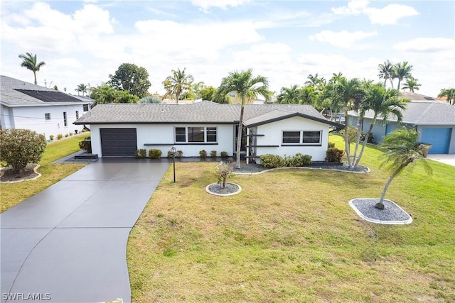 ranch-style house featuring driveway, an attached garage, a front lawn, and stucco siding