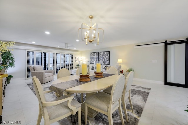 tiled dining area with a barn door and an inviting chandelier