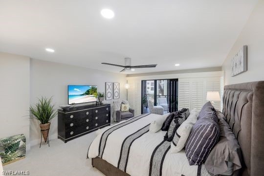 carpeted bedroom featuring ceiling fan