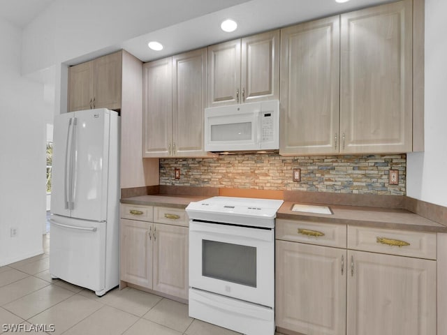 kitchen featuring backsplash, white appliances, light brown cabinetry, and light tile flooring