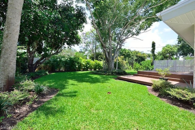 view of yard with a deck