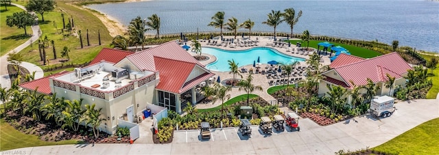 birds eye view of property featuring a water view