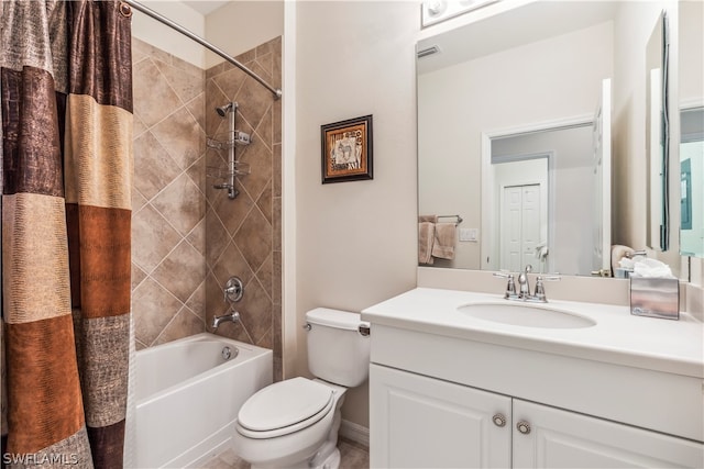 full bathroom featuring shower / bathtub combination with curtain, toilet, and vanity