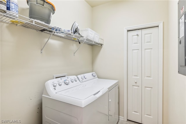 clothes washing area with independent washer and dryer