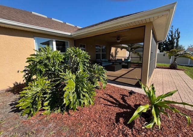 exterior space featuring a patio and ceiling fan