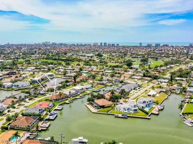 drone / aerial view with a water view