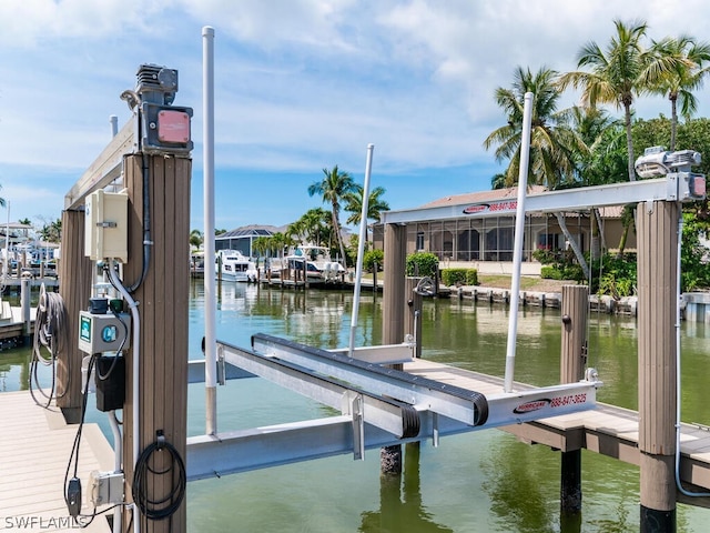 dock area with a water view