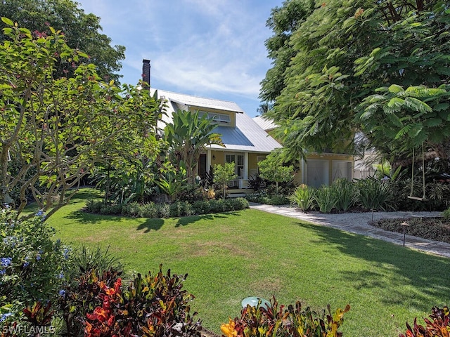 exterior space featuring a front lawn