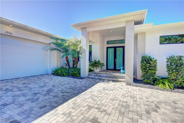 entrance to property featuring french doors