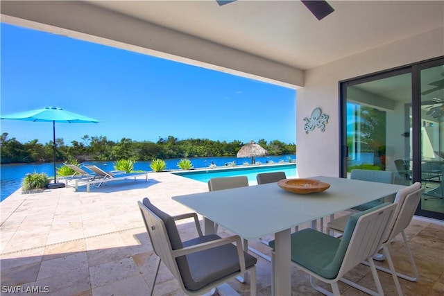 view of patio / terrace with a water view