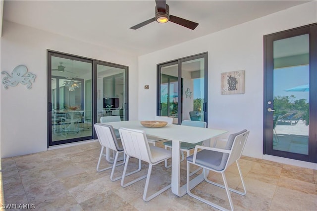 view of patio / terrace featuring ceiling fan