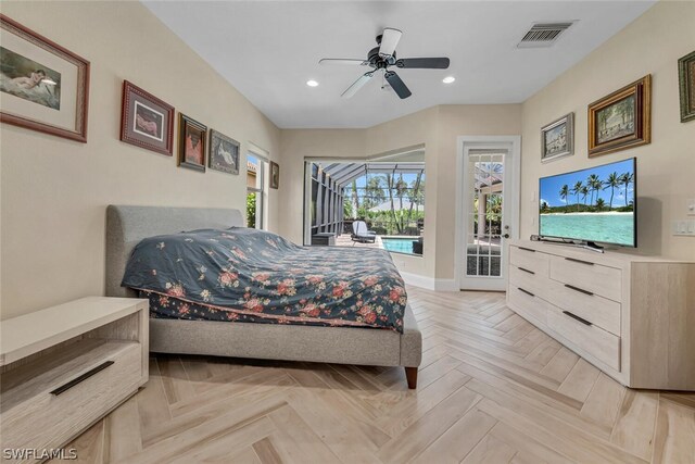 bedroom with ceiling fan, light parquet floors, and access to exterior