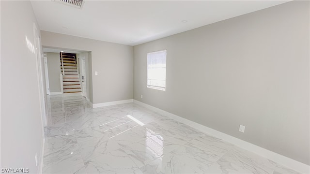 view of tiled spare room