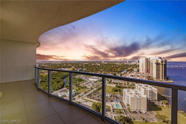 view of balcony at dusk