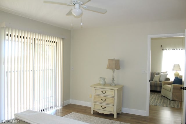 bedroom featuring ceiling fan and light wood-type flooring