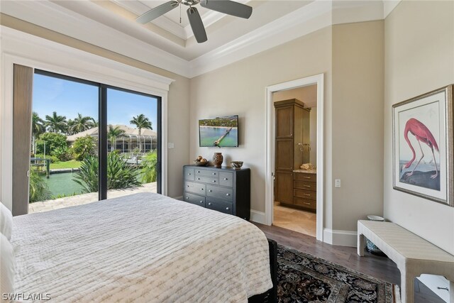 tiled bedroom featuring ceiling fan, connected bathroom, and access to outside