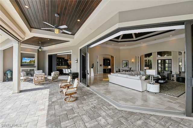 view of patio featuring ceiling fan and outdoor lounge area