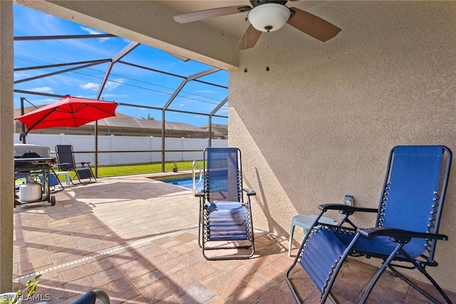 sunroom / solarium with ceiling fan