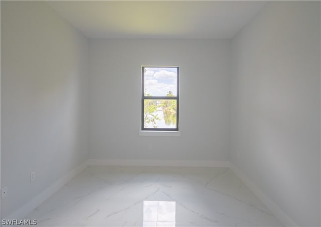 view of tiled spare room