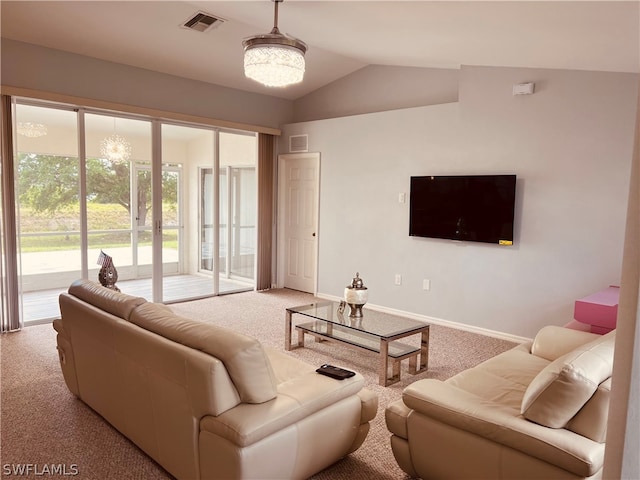 living room with lofted ceiling, a chandelier, and light colored carpet