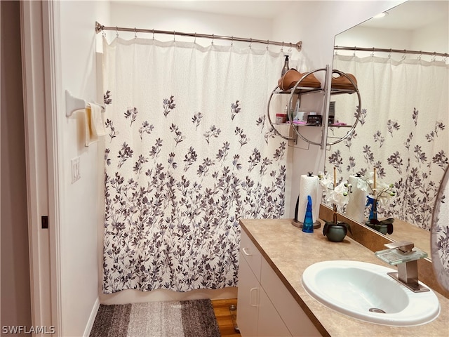 bathroom featuring oversized vanity