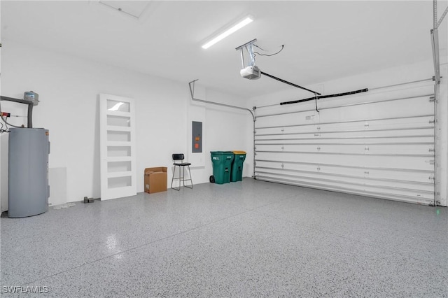 garage featuring water heater, electric panel, and a garage door opener