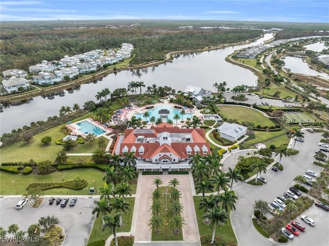 birds eye view of property featuring a water view