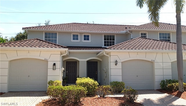 mediterranean / spanish-style house featuring a garage