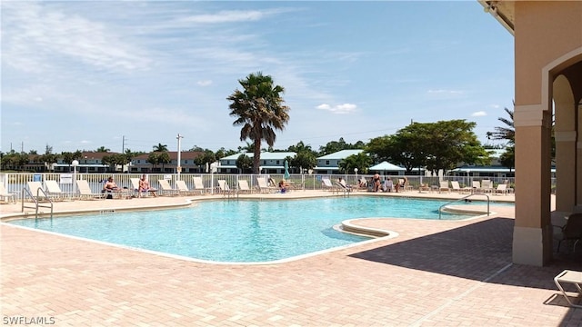 view of swimming pool featuring a patio