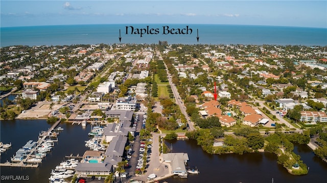 birds eye view of property featuring a water view