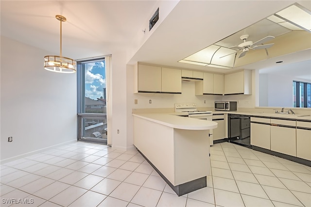 kitchen featuring kitchen peninsula, electric range, decorative light fixtures, light tile patterned floors, and ceiling fan