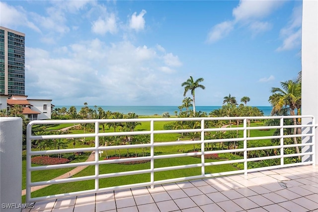 view of gate with a water view