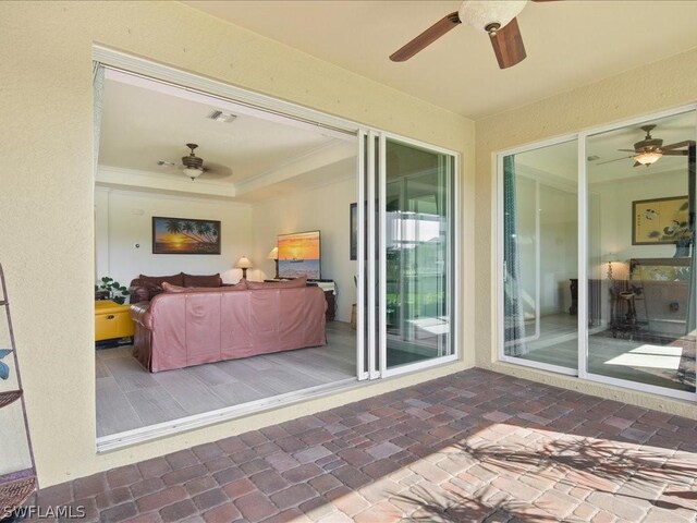 view of patio featuring ceiling fan