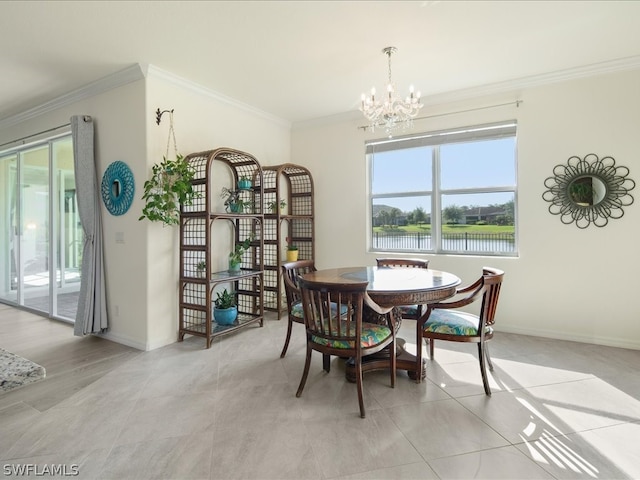 dining room with crown molding, a chandelier, and a wealth of natural light