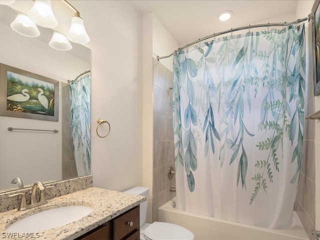 full bathroom featuring vanity, toilet, and shower / bath combo