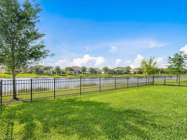 view of yard with a water view