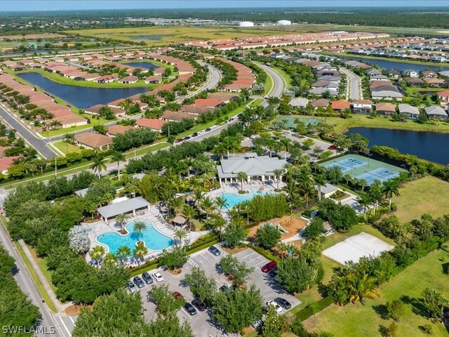 birds eye view of property featuring a water view